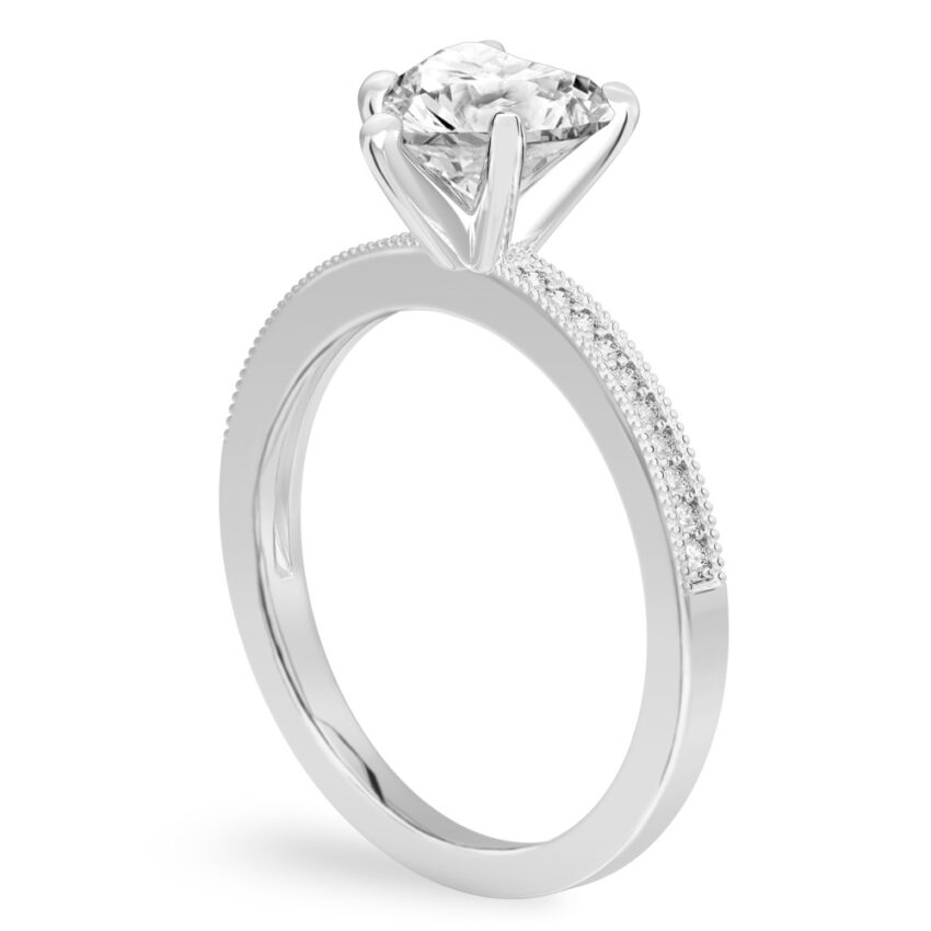 Angle view of heart shape diamond petite milgrain diamond engagement ring in palladium