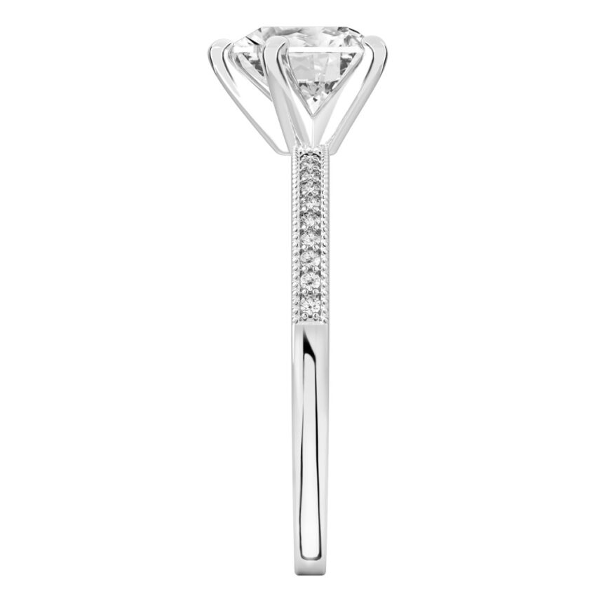 Side view of heart shape diamond petite milgrain diamond engagement ring in platinum