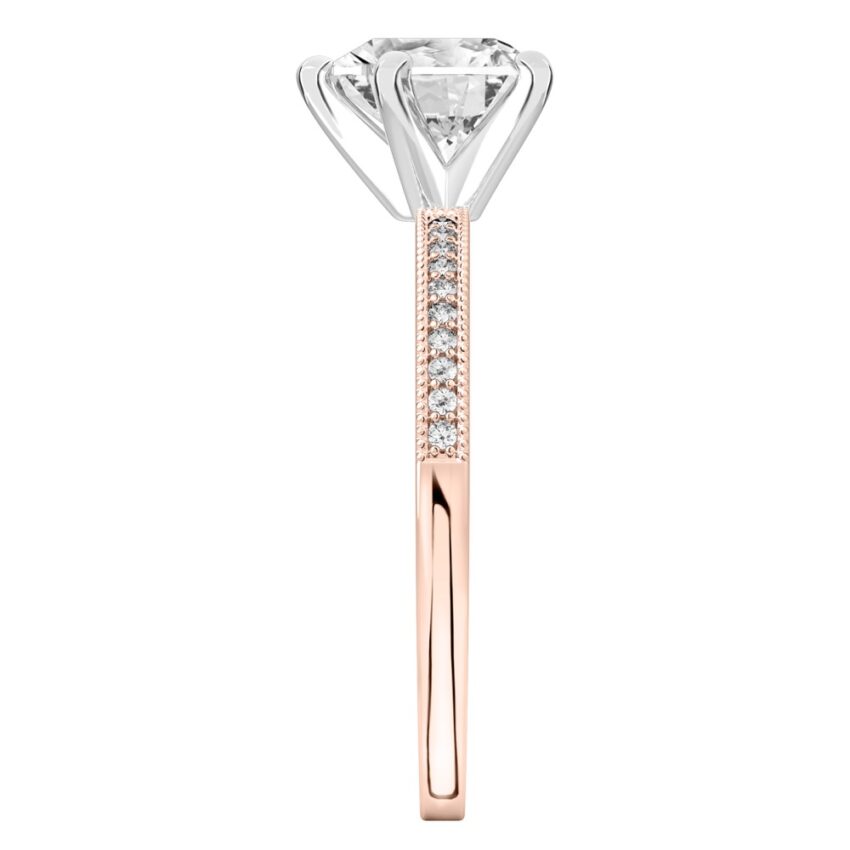 Side view of heart shape diamond petite milgrain diamond engagement ring in rose gold