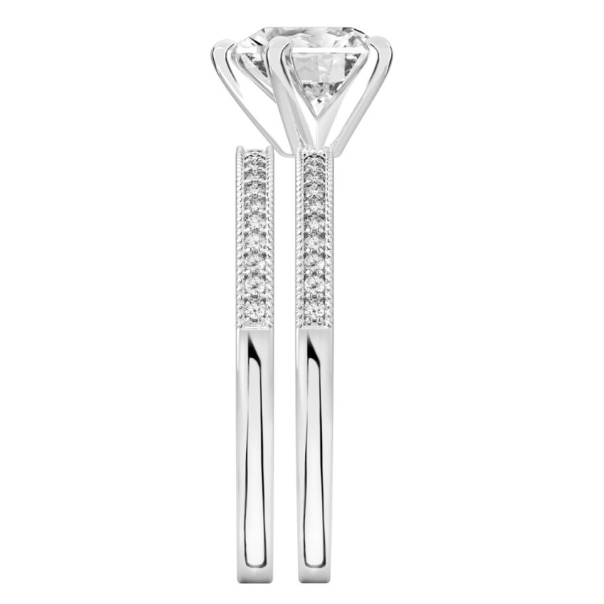 Side view of heart shape diamond petite milgrain diamond engagement ring set white gold
