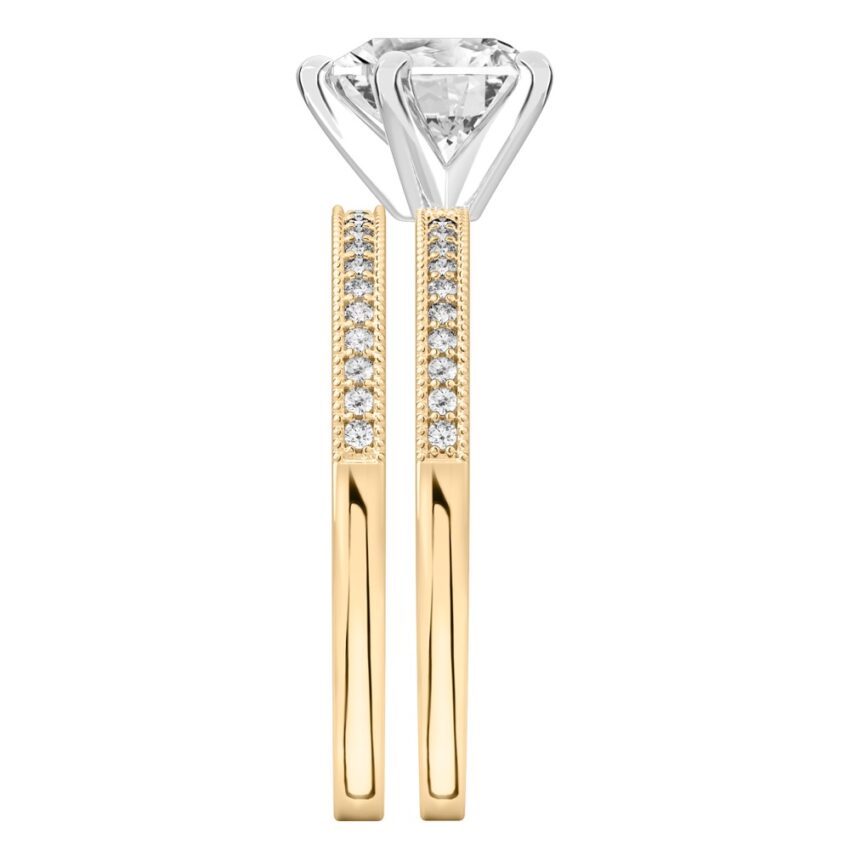 Side view of heart shape diamond petite milgrain diamond engagement ring set yellow gold