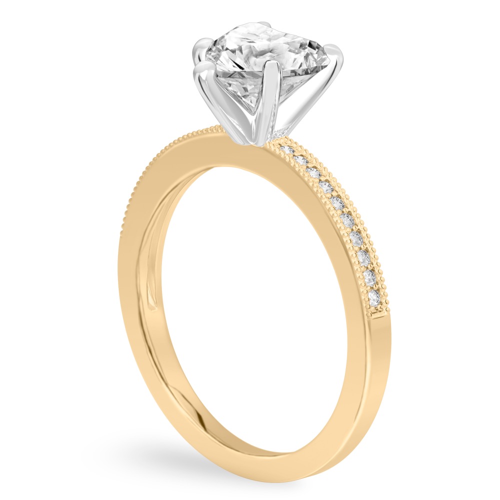 Angle view of heart shape diamond petite milgrain diamond engagement ring in yellow gold