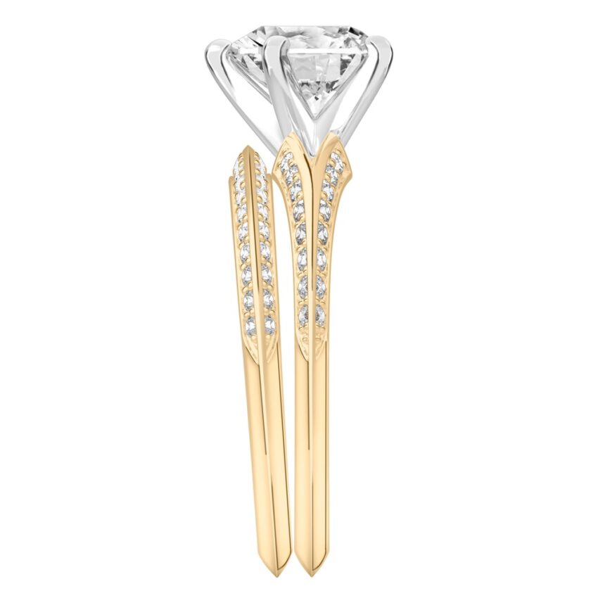 Side view of heart shape diamond split shank knife edge engagement ring in set yellow gold