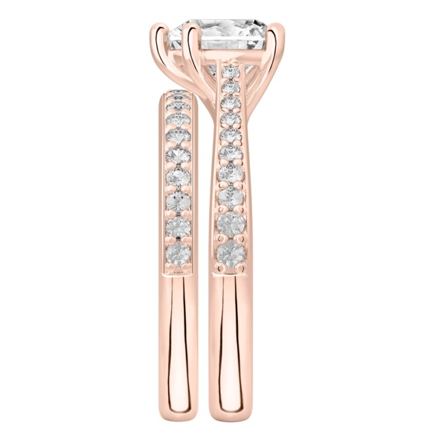 Side view of heart shape diamond tapered engagement ring set rose gold