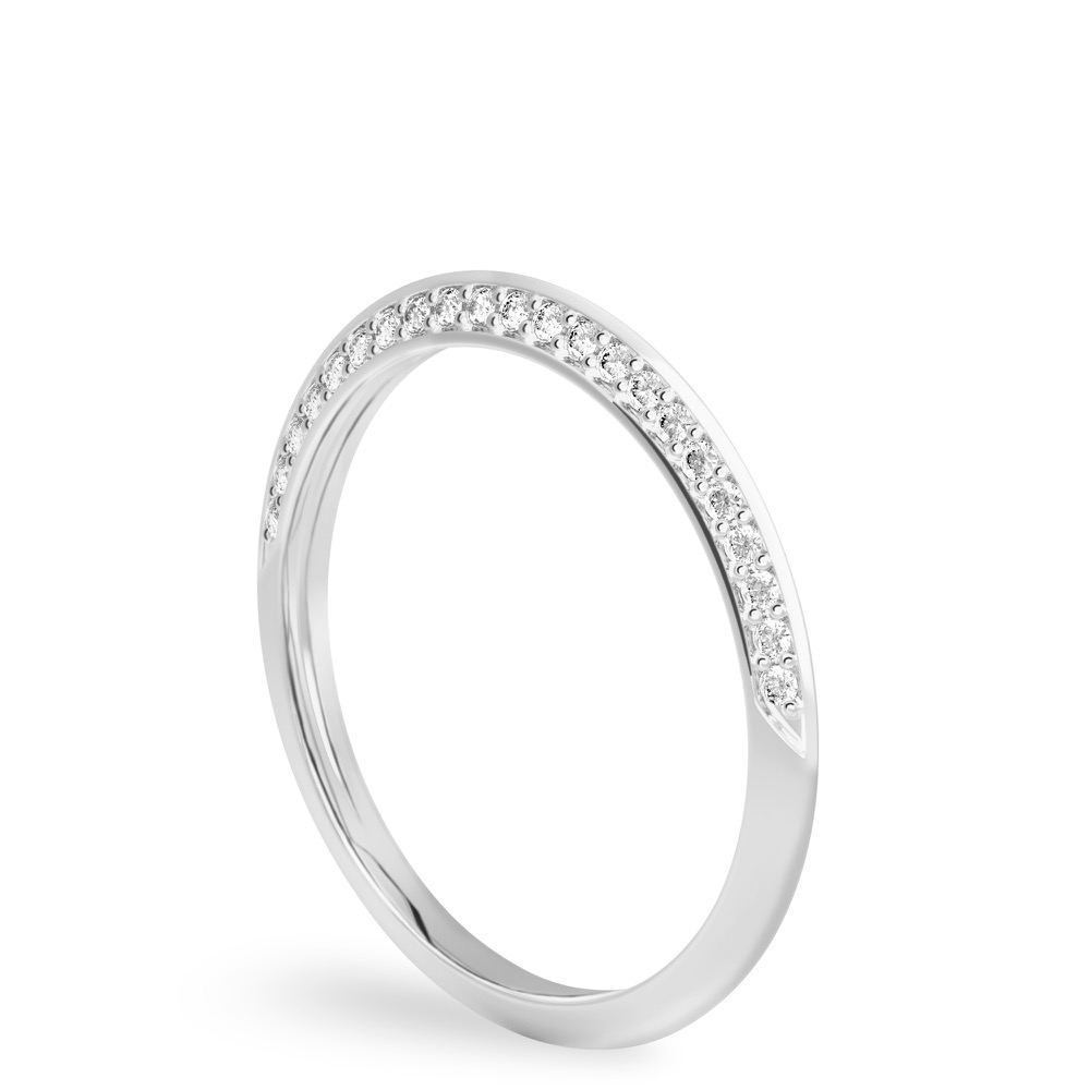 Angle view of knife edge wedding band in with diamonds palladium