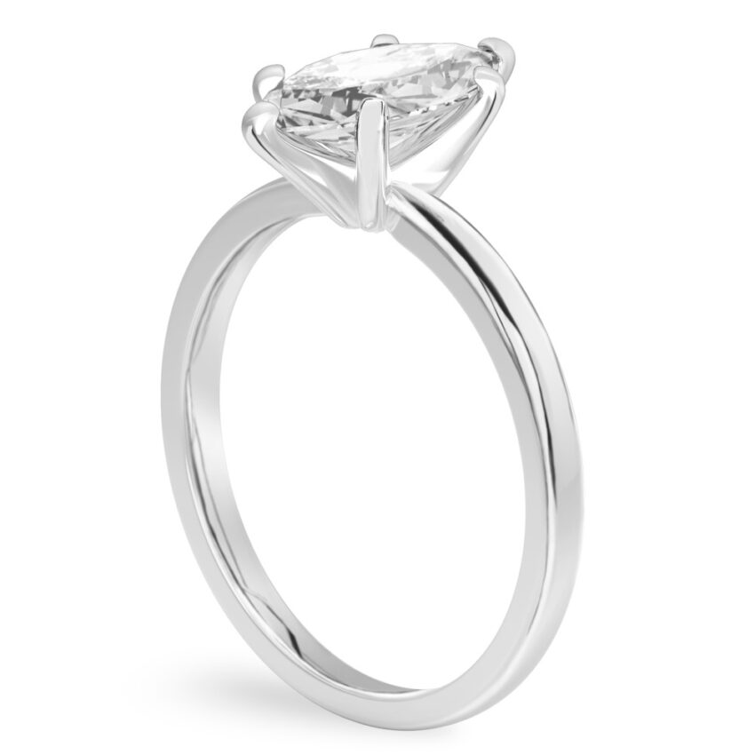 Angle view of marquise cut diamond classic solitaire engagement ring in palladium