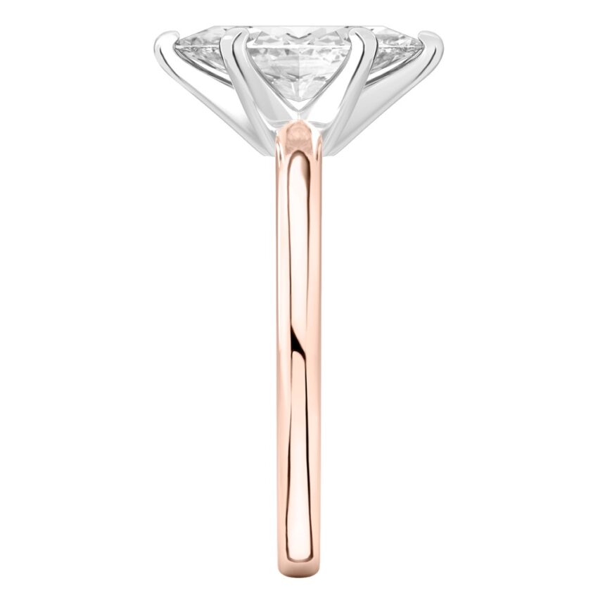 Side view of marquise cut diamond classic solitaire engagement ring in rose gold