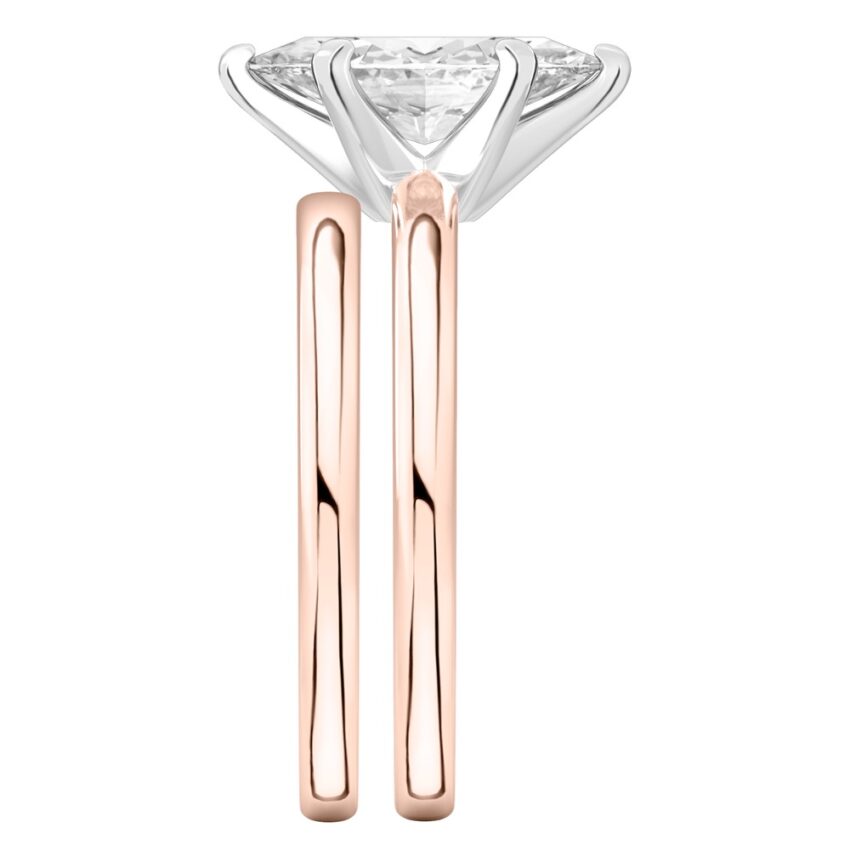 Side view of marquise cut diamond classic solitaire engagement ring set rose gold