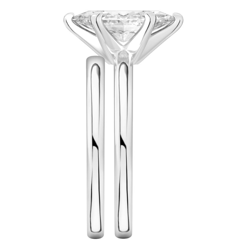 Side view of marquise cut diamond classic solitaire engagement ring set white gold