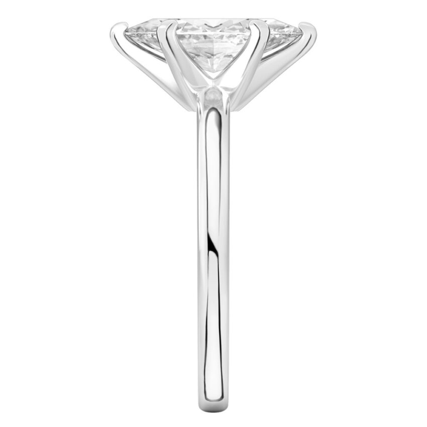 Side view of marquise cut diamond classic solitaire engagement ring in white gold