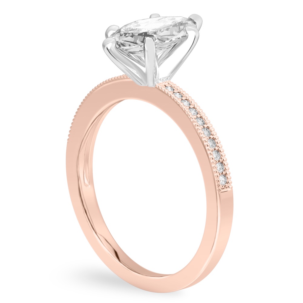 Angle view of marquise cut diamond petite milgrain diamond engagement ring in rose gold