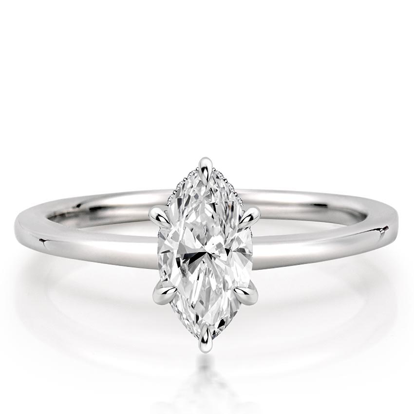 marquise cut diamond secret halo engagement ring in platinum