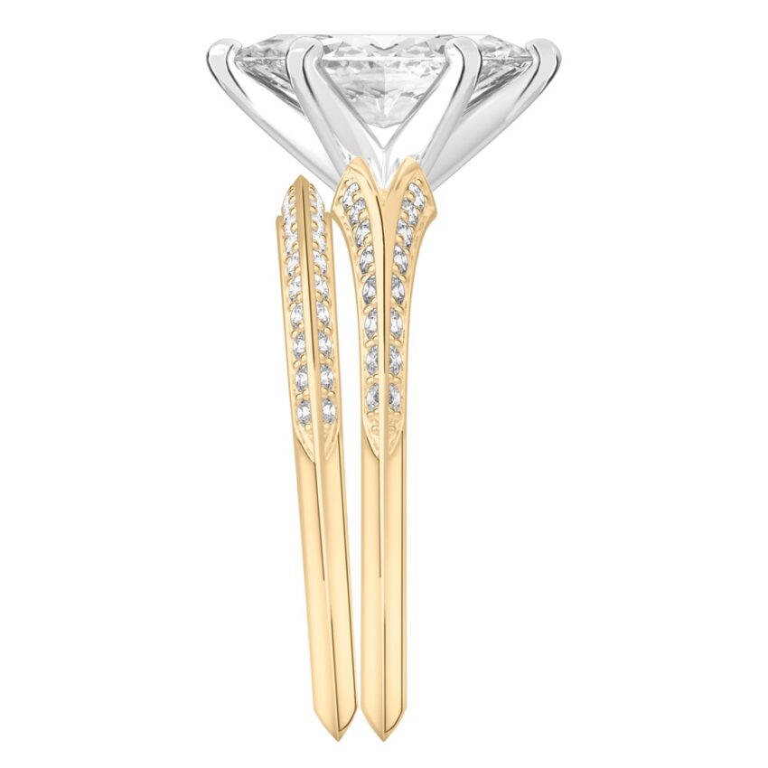 Side view of marquise cut diamond split shank knife edge engagement ring in set yellow gold