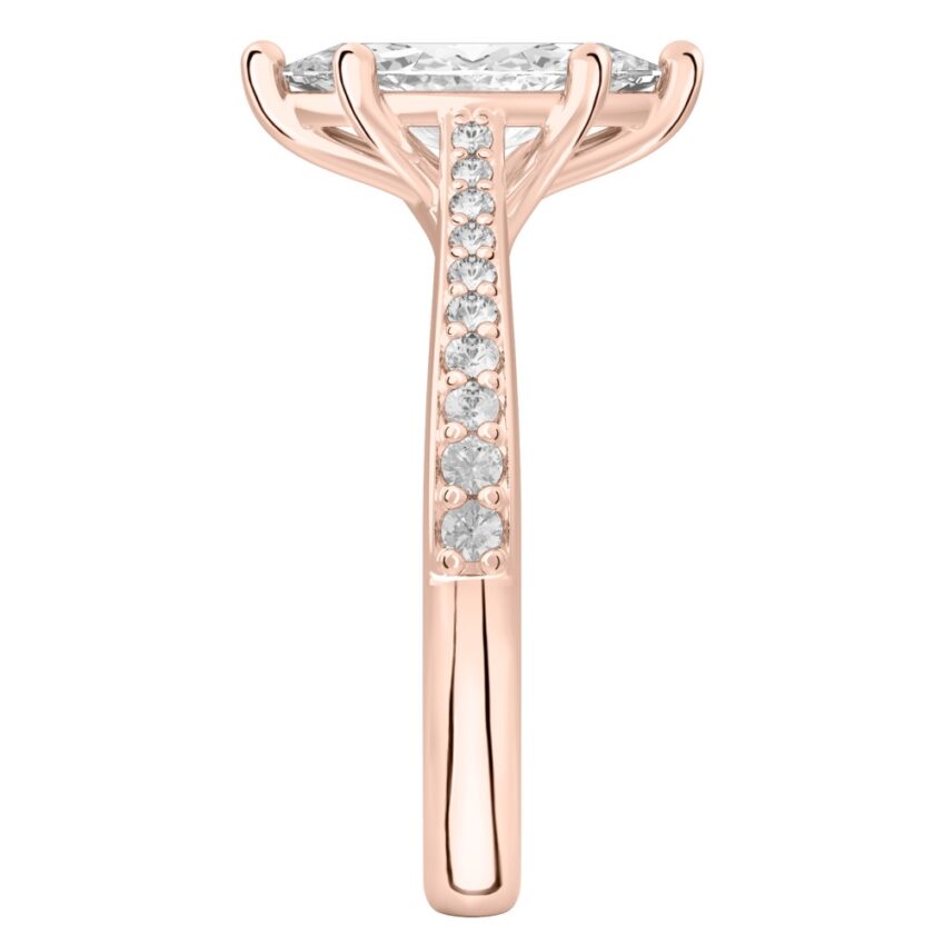 Side view of marquise cut diamond tapered engagement ring in rose gold