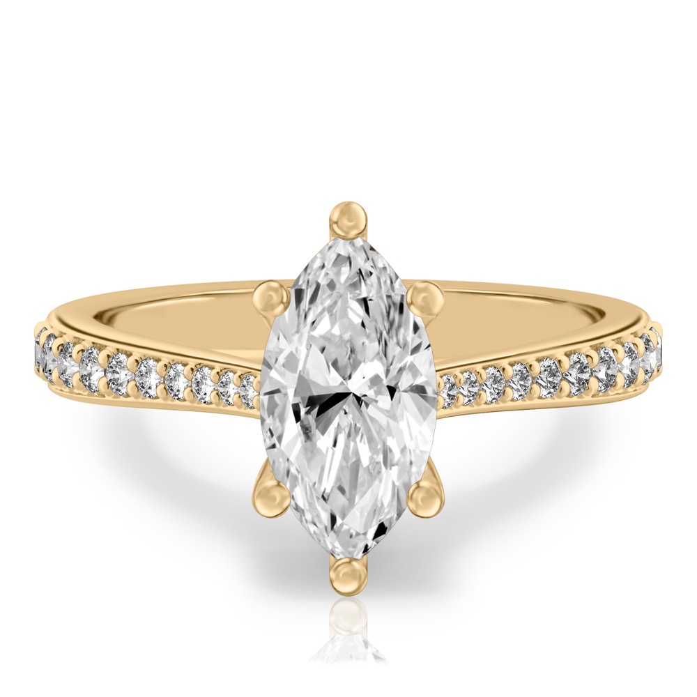 marquise cut diamond tapered engagement ring in yellow gold