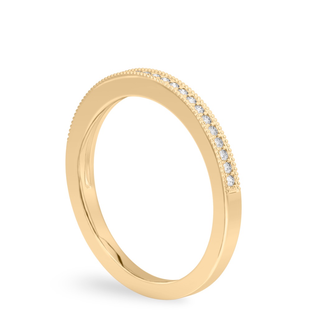 Angle view of milgrain diamond wedding band in yellow gold