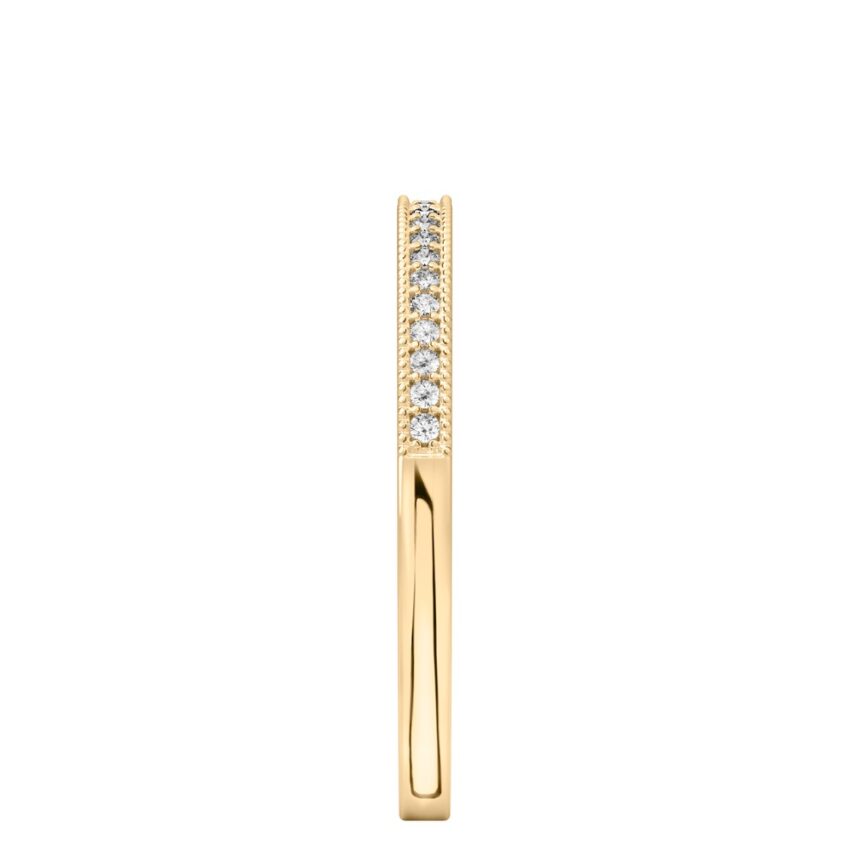 Side view of milgrain diamond wedding band in yellow gold