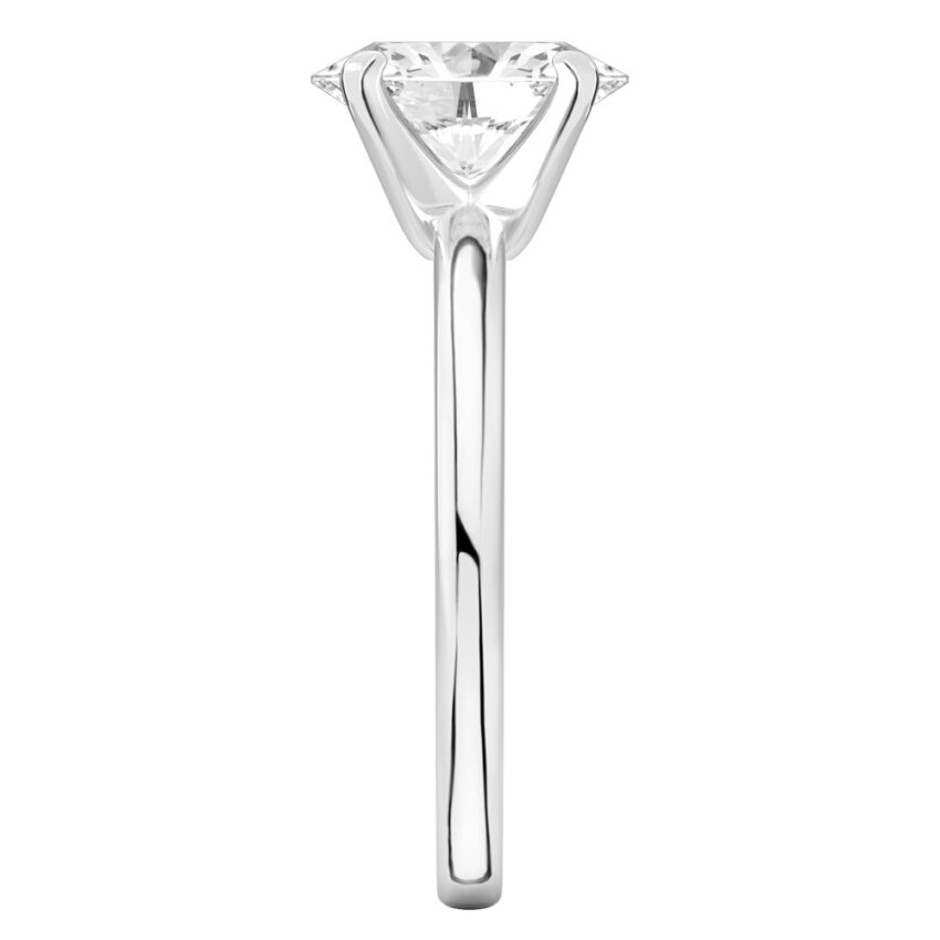 Side view of oval shape diamond classic solitaire engagement ring in platinum