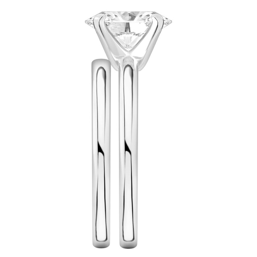 Side view of oval shape diamond classic solitaire engagement ring set palladium