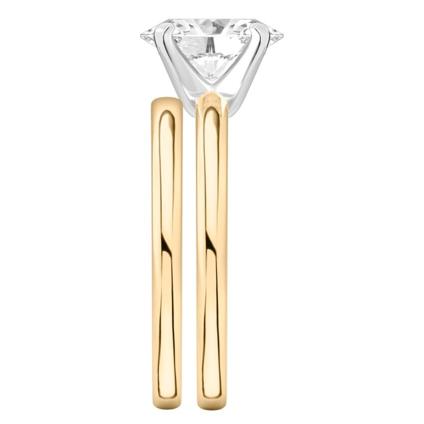 Side view of oval shape diamond classic solitaire engagement ring set yellow gold