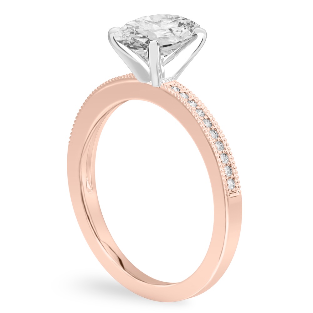 Angle view of oval shape diamond petite milgrain diamond engagement ring in rose gold