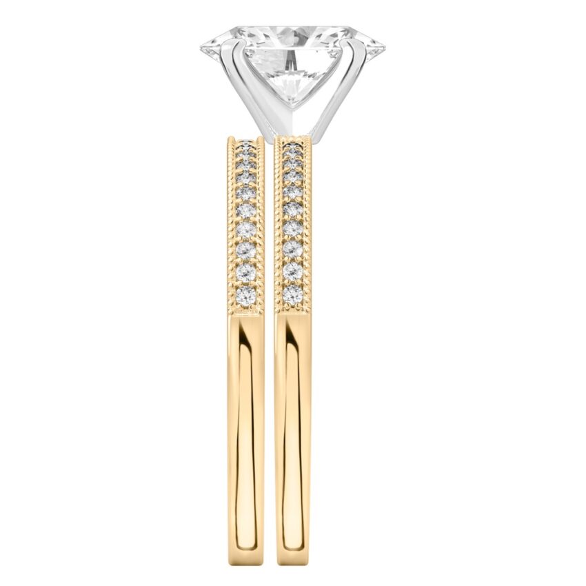 Side view of oval shape diamond petite milgrain diamond engagement ring set yellow gold