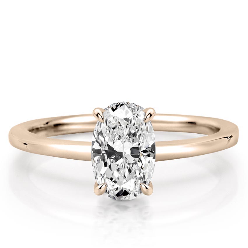 oval shape diamond secret halo engagement ring in rose gold