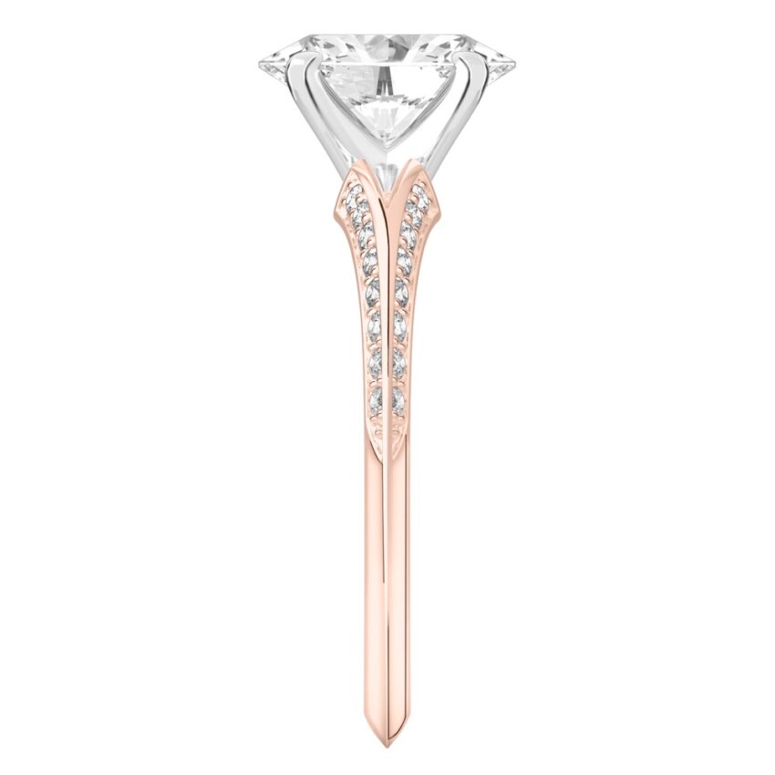 Side view of oval shape diamond split shank knife edge engagement ring in rose gold