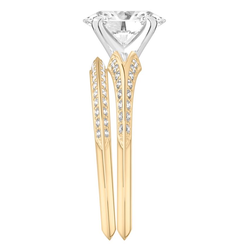 Side view of oval shape diamond split shank knife edge engagement ring in set yellow gold