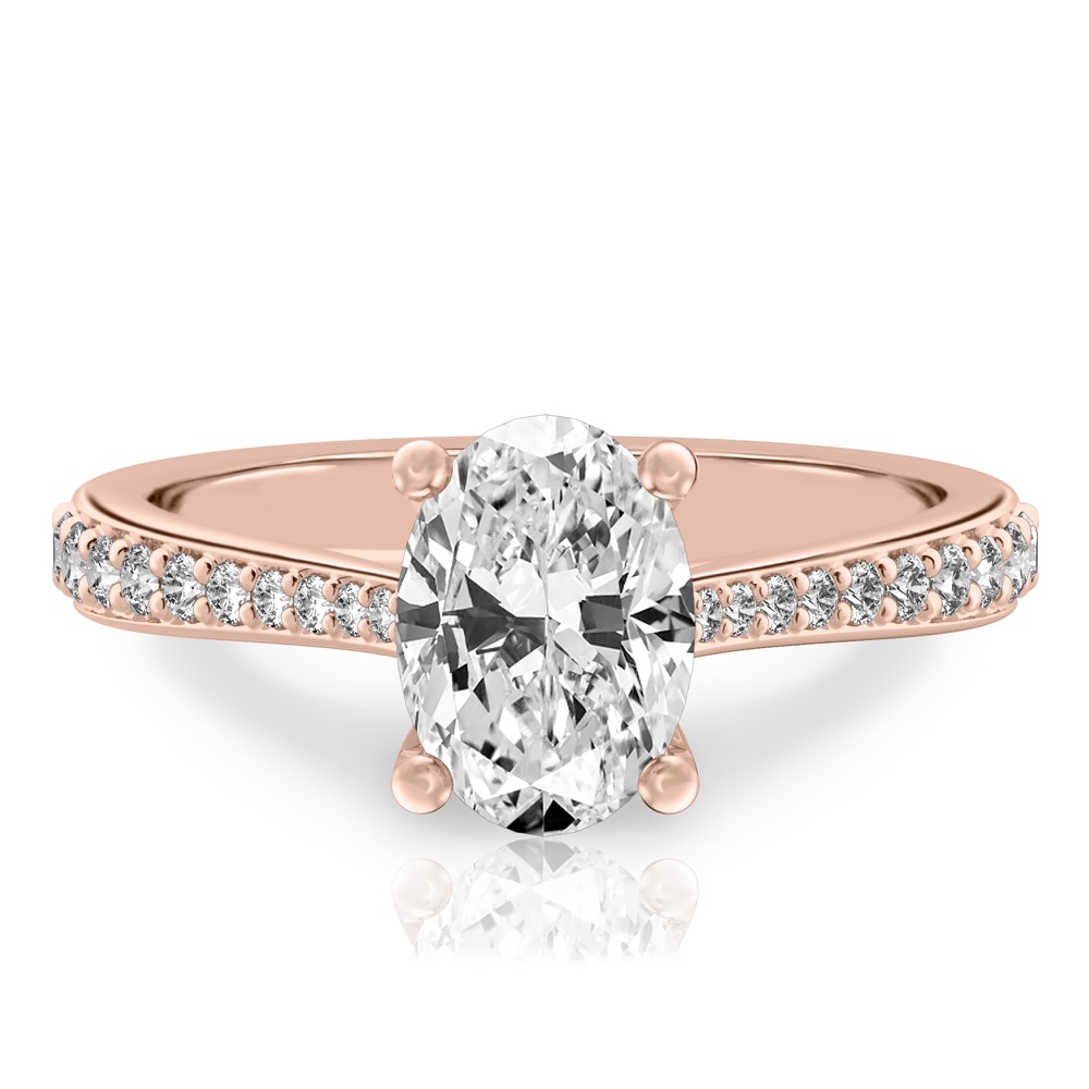 oval shape diamond tapered engagement ring in rose gold