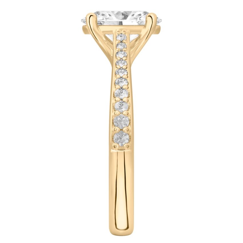 Side view of oval shape diamond tapered engagement ring in yellow gold