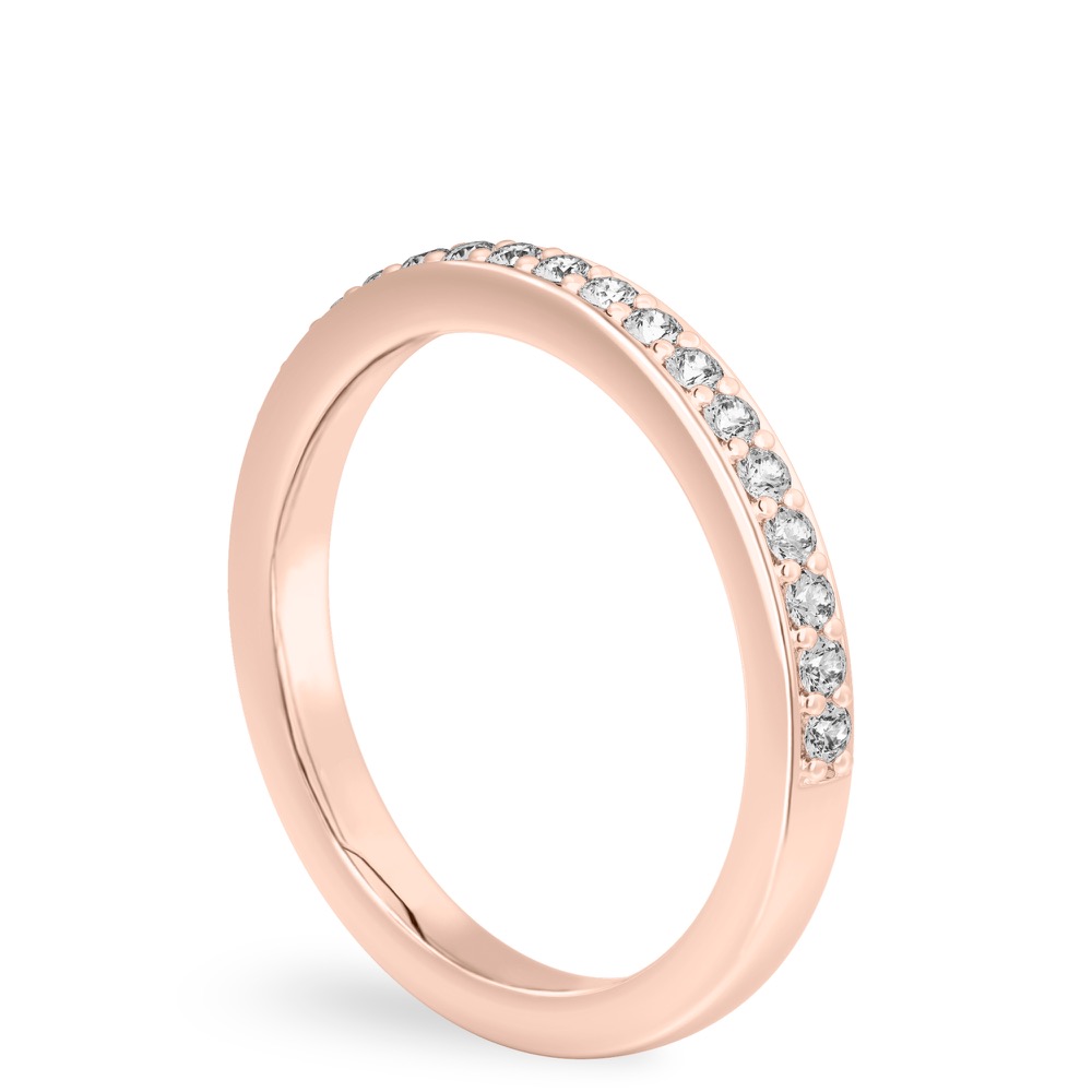 Angle view of pave diamond wedding band in rose gold