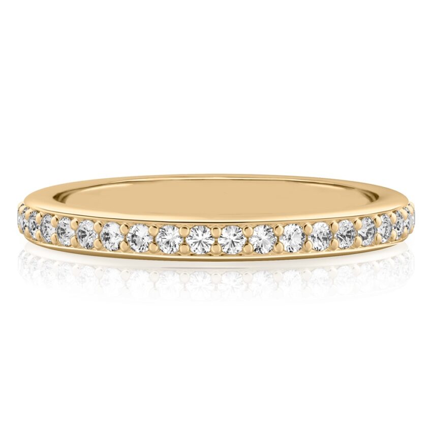 pave diamond wedding band in yellow gold