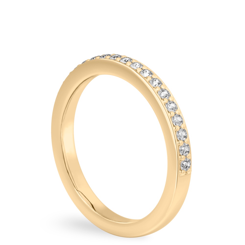 Angle view of pave diamond wedding band in yellow gold