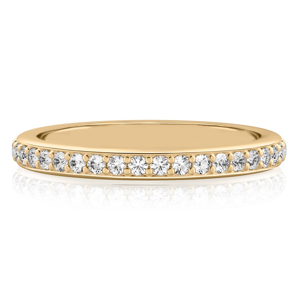 pave diamond wedding band in yellow gold