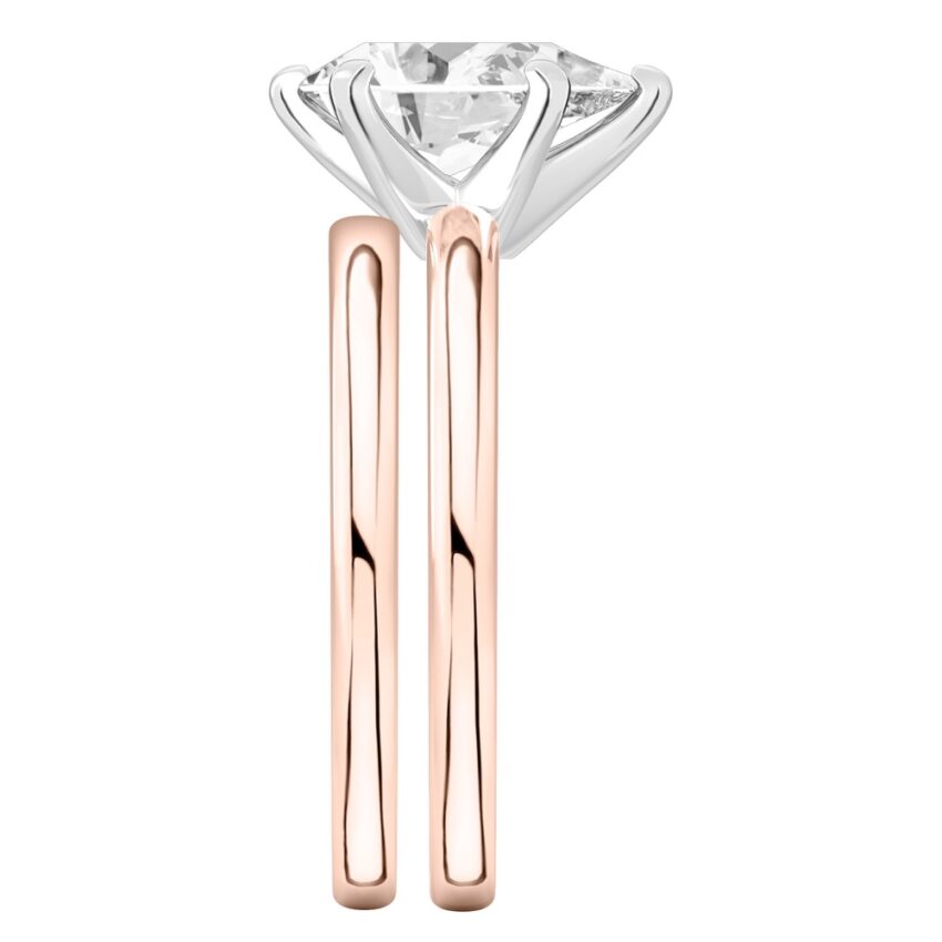 Side view of pear shape diamond classic solitaire engagement ring set rose gold