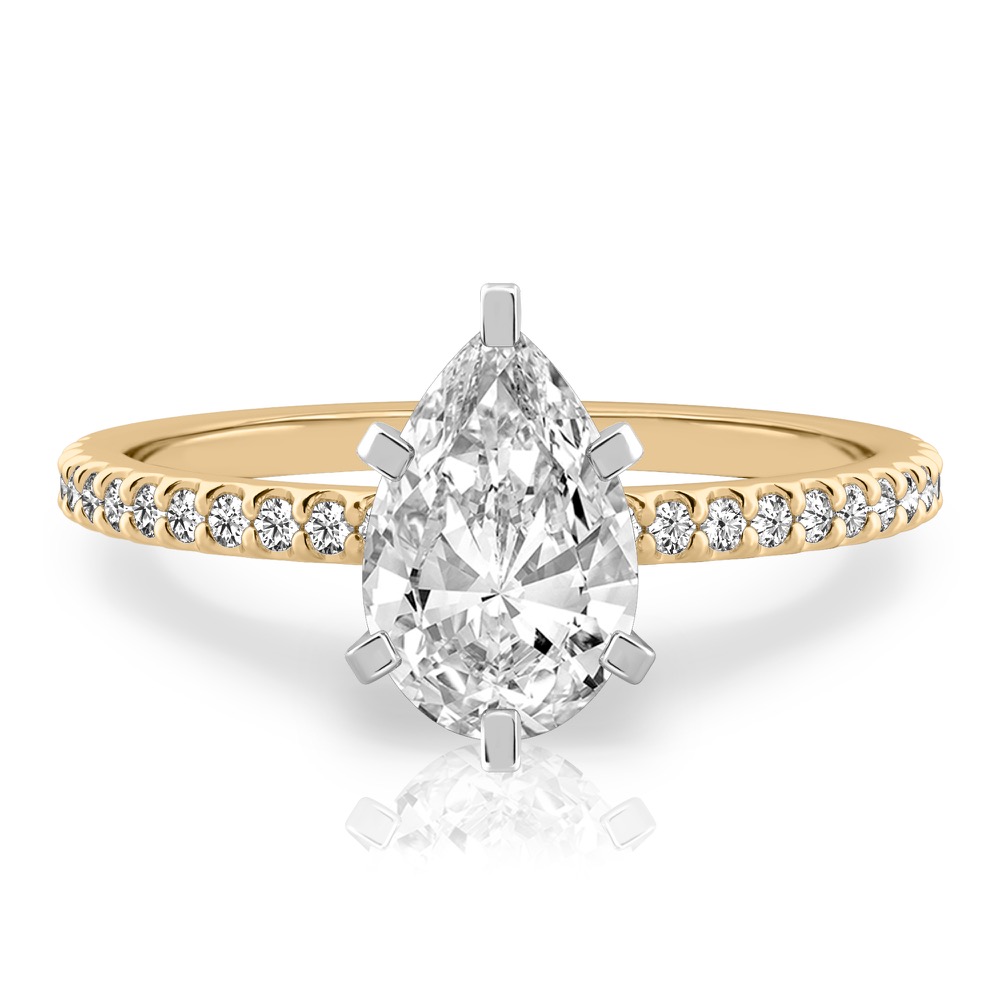 pear shape diamond dainty engagement ring yellow gold