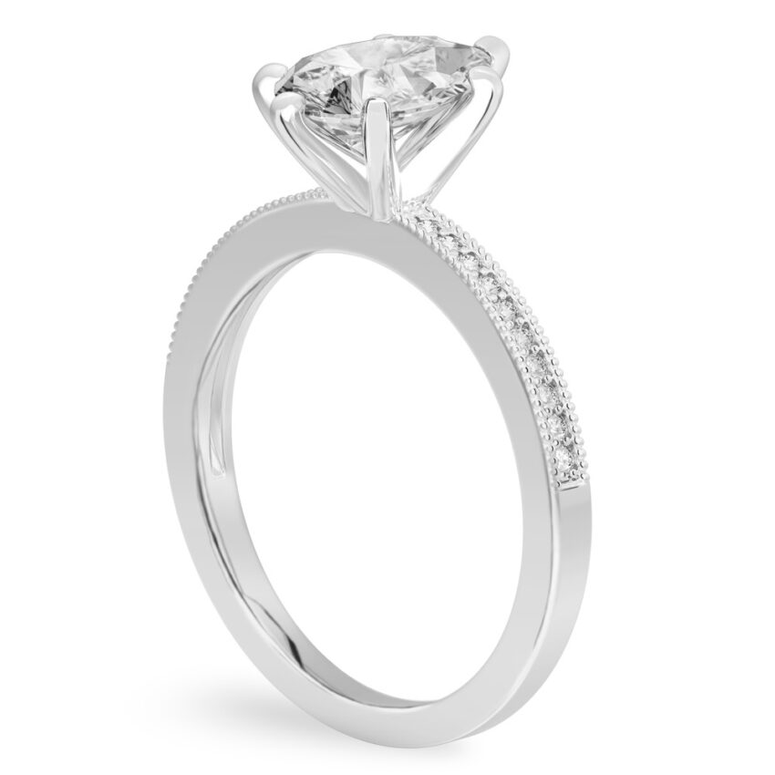 Angle view of pear shape diamond petite milgrain diamond engagement ring in palladium