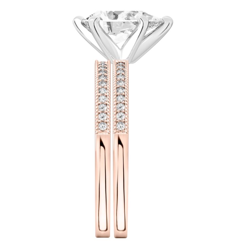 Side view of pear shape diamond petite milgrain diamond engagement ring set rose gold