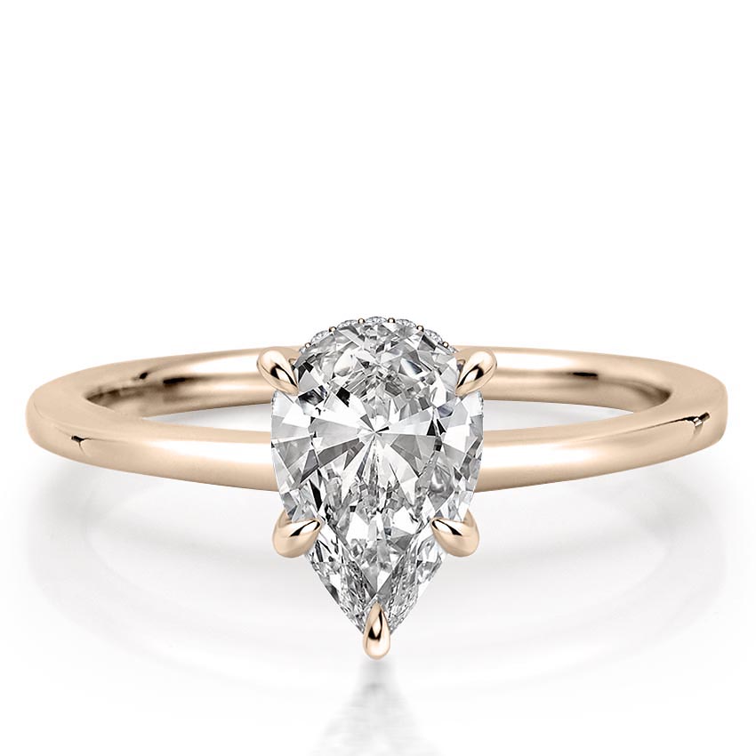 pear shape diamond secret halo engagement ring in rose gold