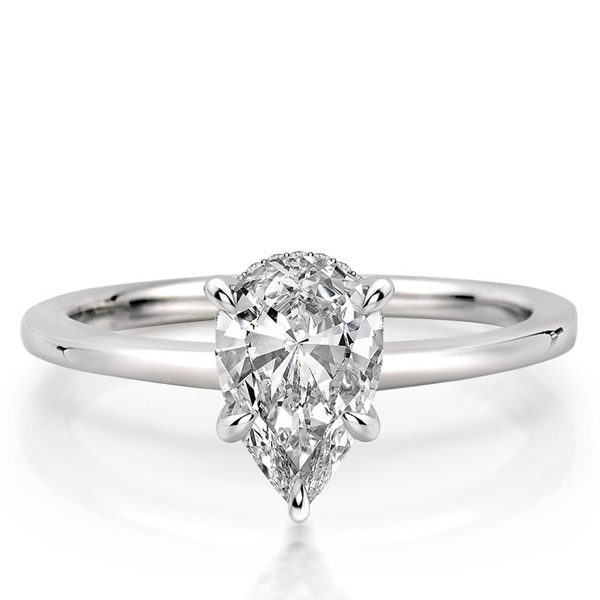 pear shape diamond secret halo engagement ring in white gold