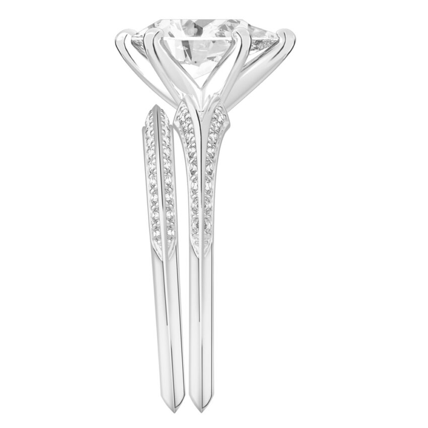 Side view of pear shape diamond split shank knife edge engagement ring in set palladium