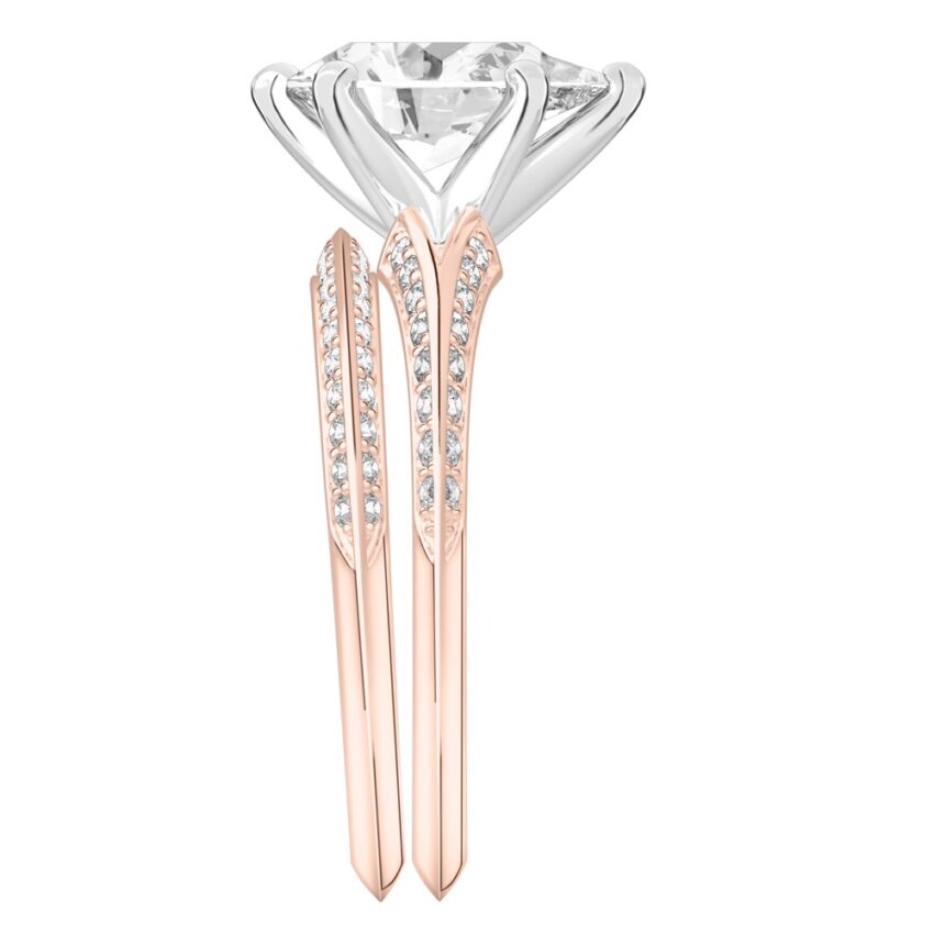 Side view of pear shape diamond split shank knife edge engagement ring in set rose gold