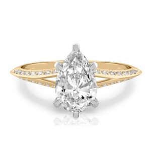 pear shape diamond split shank knife edge engagement ring in yellow gold