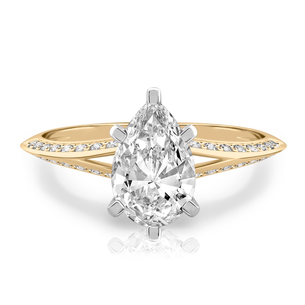 pear shape diamond split shank knife edge engagement ring in yellow gold