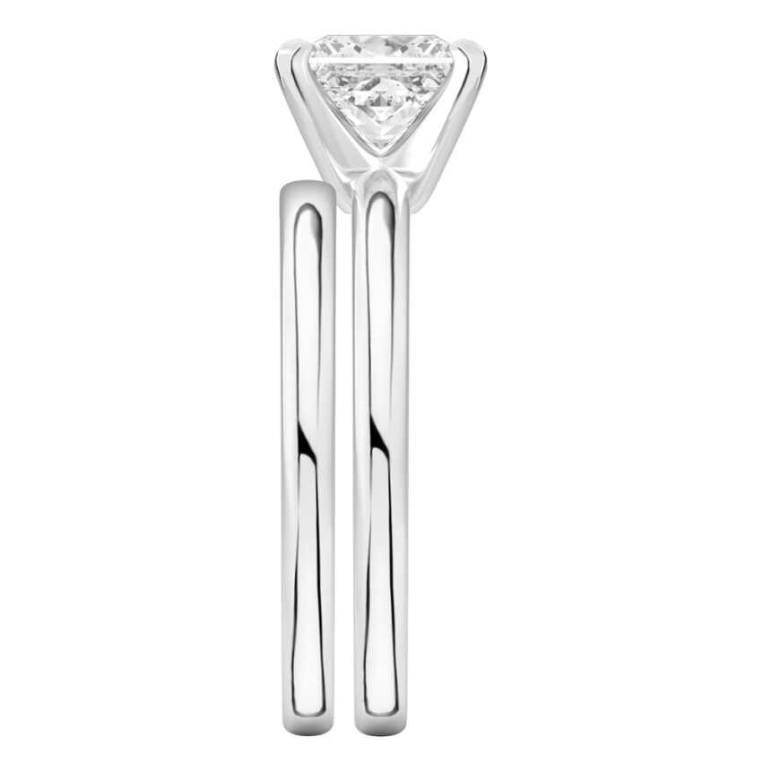 Side view of princess cut diamond classic solitaire engagement ring set platinum