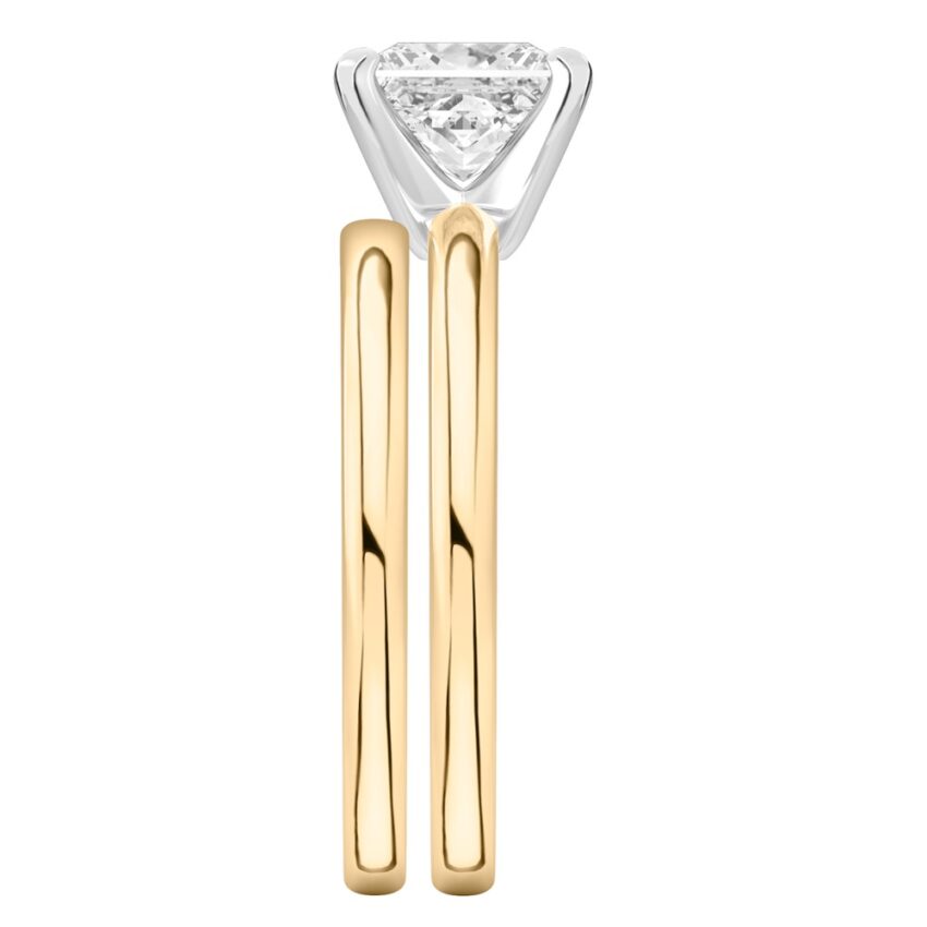 Side view of princess cut diamond classic solitaire engagement ring set yellow gold