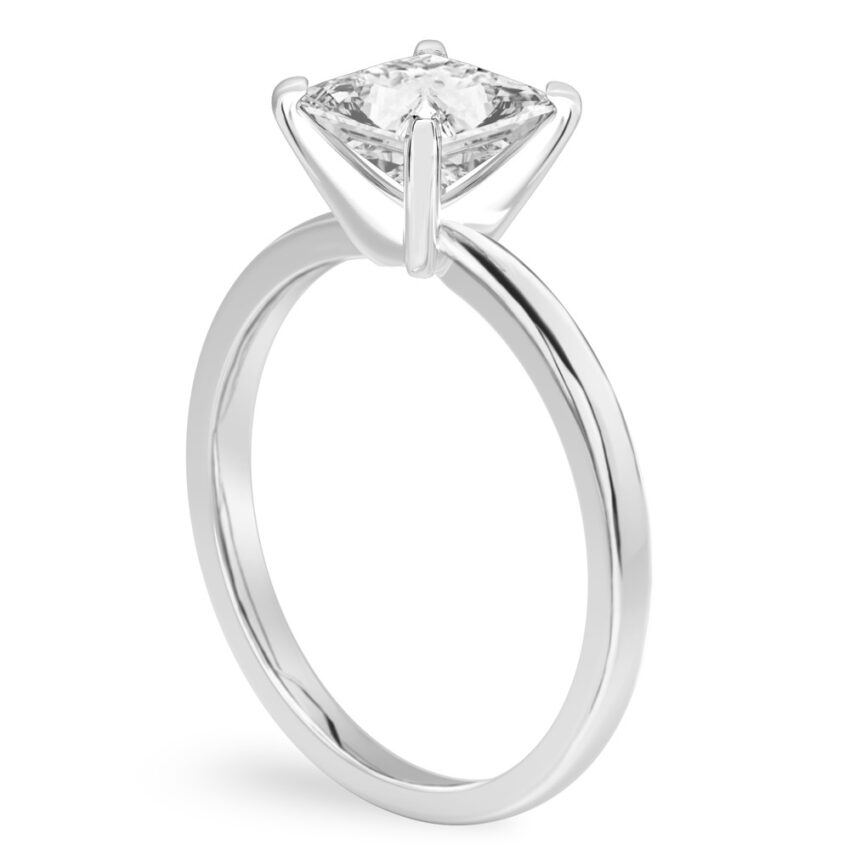 Angle view of princess cut diamond classic solitaire engagement ring in white gold