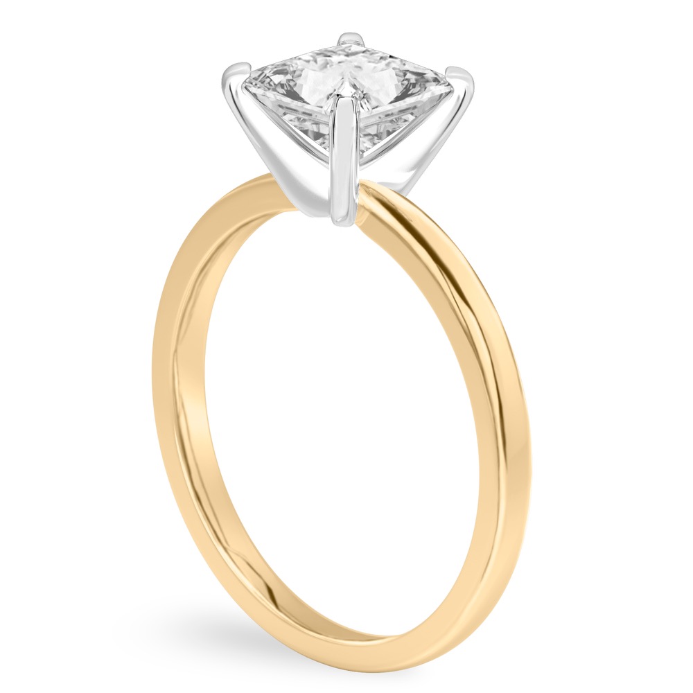 Angle view of princess cut diamond classic solitaire engagement ring in yellow gold