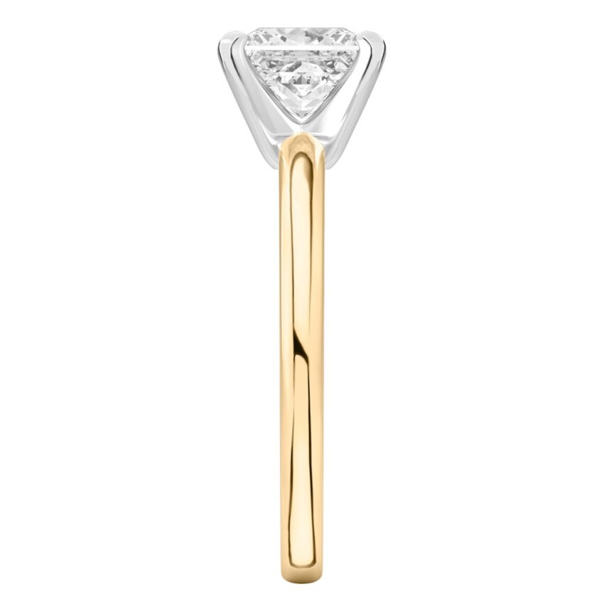 Side view of princess cut diamond classic solitaire engagement ring in yellow gold